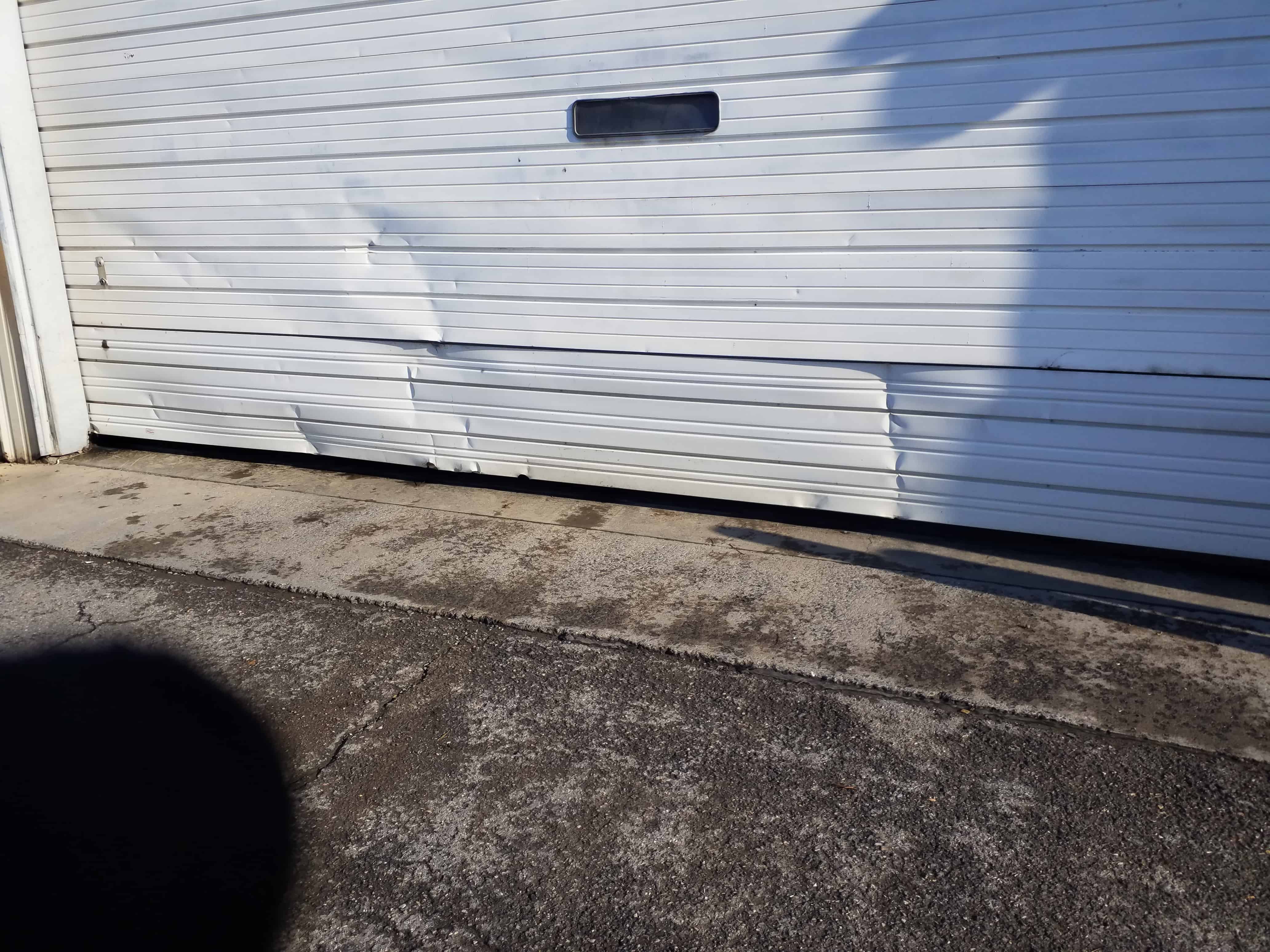 commercial door hit with fork lift